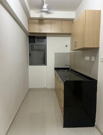 Kitchen in 1 BHK Apartment at Lodha Unica, Jogeshwari West – for Sale
