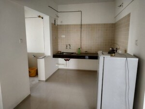 Kitchen in 3 BHK Apartment at Kunal Iconia, Mamurdi – for Rent