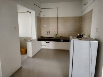 Kitchen in 3 BHK Apartment at Kunal Iconia, Mamurdi – for Rent