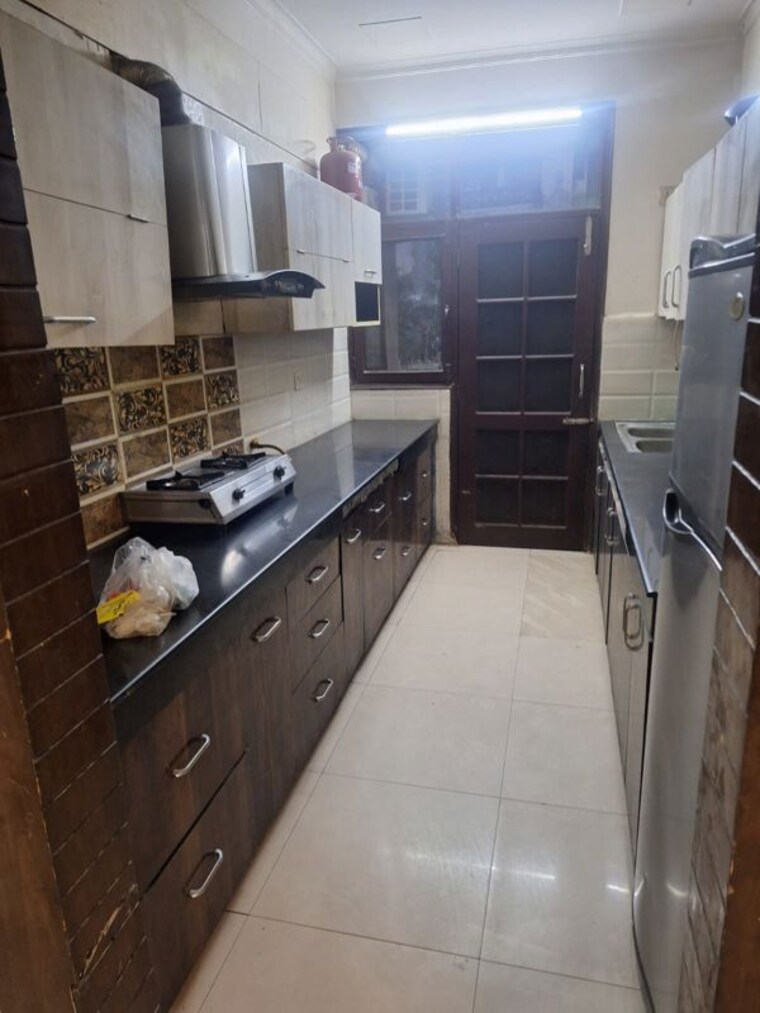 Kitchen, aditya-palm-court 4 Bedroom 2100 Sq.Ft. Apartment In Vip Road Zirakpur 10060936