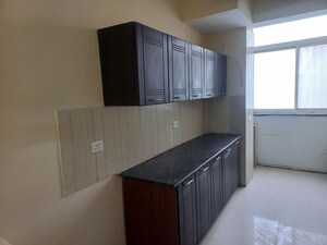 Kitchen in 4 BHK Apartment at Prateek Wisteria, Sector 77 – for Sale