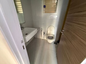 Bathroom in 2 BHK Apartment at Riddhi Gardens CHS, Malad East – for Rent