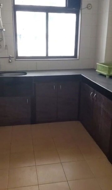 Kitchen in 2 BHK Apartment at Orchid CHS Majiwada, Majiwada – for Rent