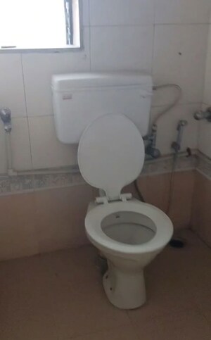 Bathroom in 2 BHK Apartment at Orchid CHS Majiwada, Majiwada – for Rent