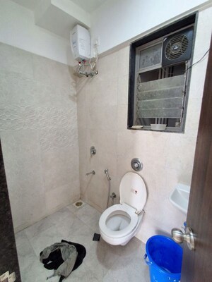 Bathroom in 1 BHK Apartment at UK Iridium, Kandivali East – for Rent