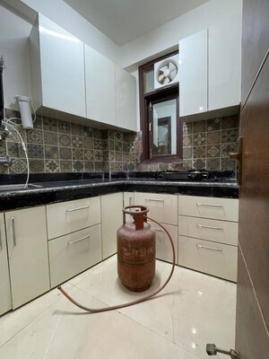 Kitchen in 1 RK Builder Floor at Chattarpur – for Rent