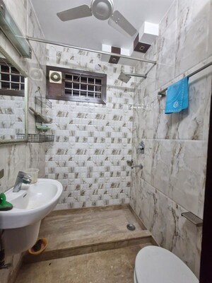 Bathroom in 3 BHK Builder Floor at Kalkaji – for Rent