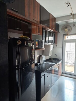 Kitchen in 3 BHK Apartment at Sheth Vasant Lawns, Laxmi Nagar – for Rent