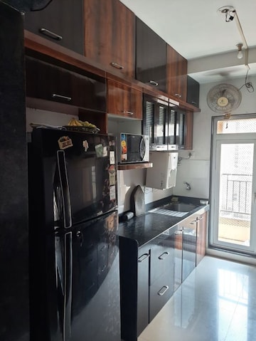 Kitchen in 3 BHK Apartment at Sheth Vasant Lawns, Laxmi Nagar – for Rent