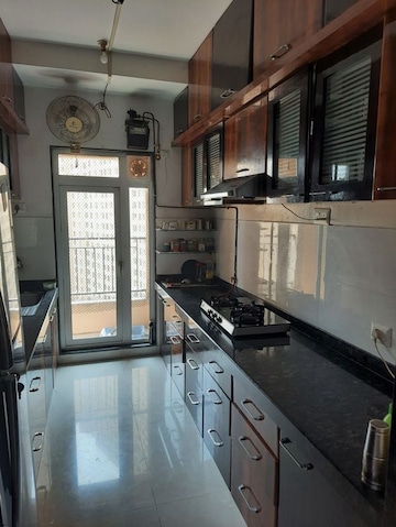 Kitchen in 3 BHK Apartment at Sheth Vasant Lawns, Laxmi Nagar – for Rent