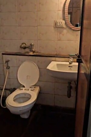 Bathroom in 2 BHK Apartment at Raunak Park, Kokanipada – for Rent