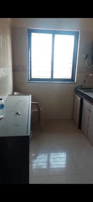 Kitchen in 2 BHK Apartment at K Raheja Palm Spring, Malad West – for Rent