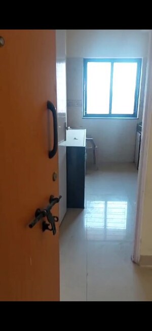 Living Room in 2 BHK Apartment at K Raheja Palm Spring, Malad West – for Rent