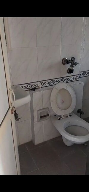 Bathroom in 2 BHK Apartment at K Raheja Palm Spring, Malad West – for Rent