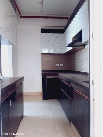 Kitchen in 2 BHK Apartment at Ace Divino, Sector 1 Greater Noida – for Rent