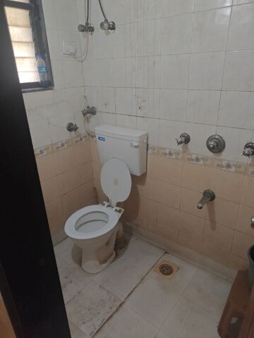 Bathroom in 2 BHK Apartment at Mudit Garden, Kopar Khairane – for Rent