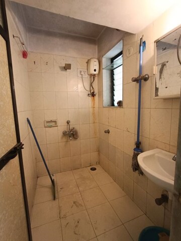 Bathroom in 1 BHK Apartment at Dipti Blossom, Borivali West – for Rent