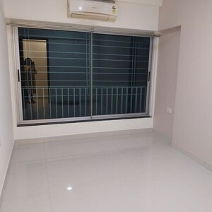 Room in 2 BHK Apartment at Arkade Earth Bluebell, Datar Colony – for Rent