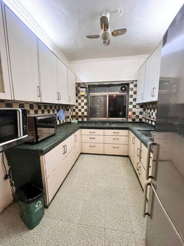 Kitchen in 2 BHK Apartment at Yari Road – for Rent