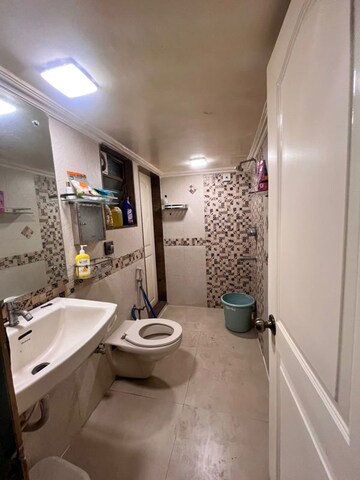Attached Bathroom in 2 BHK Apartment at Yari Road – for Rent