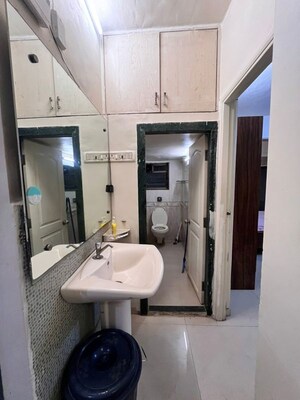 Bathroom in 2 BHK Apartment at Yari Road – for Rent