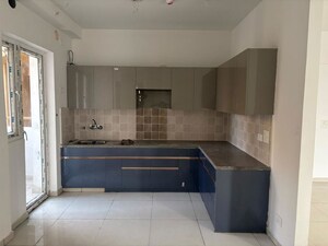 Kitchen in 3 BHK Apartment at Nirala Estate II, Tech Zone 4 Greater Noida – for Rent