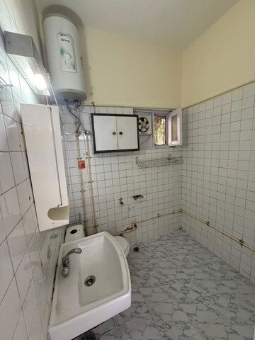 Bathroom in 3 BHK Builder Floor at Nehru Enclave – for Rent