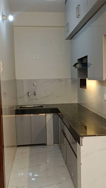 Kitchen in 3 BHK Builder Floor at Shalimar Garden Extension I – for Sale