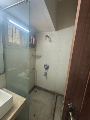 Bathroom in 3 BHK Apartment at Gulmohar Park – for Rent