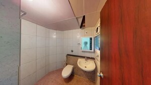 Bathroom in 3 BHK Apartment at Shriram Greenfield, Budigere – for Sale