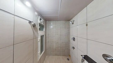 Bathroom in 3 BHK Apartment at Shriram Greenfield, Budigere – for Sale