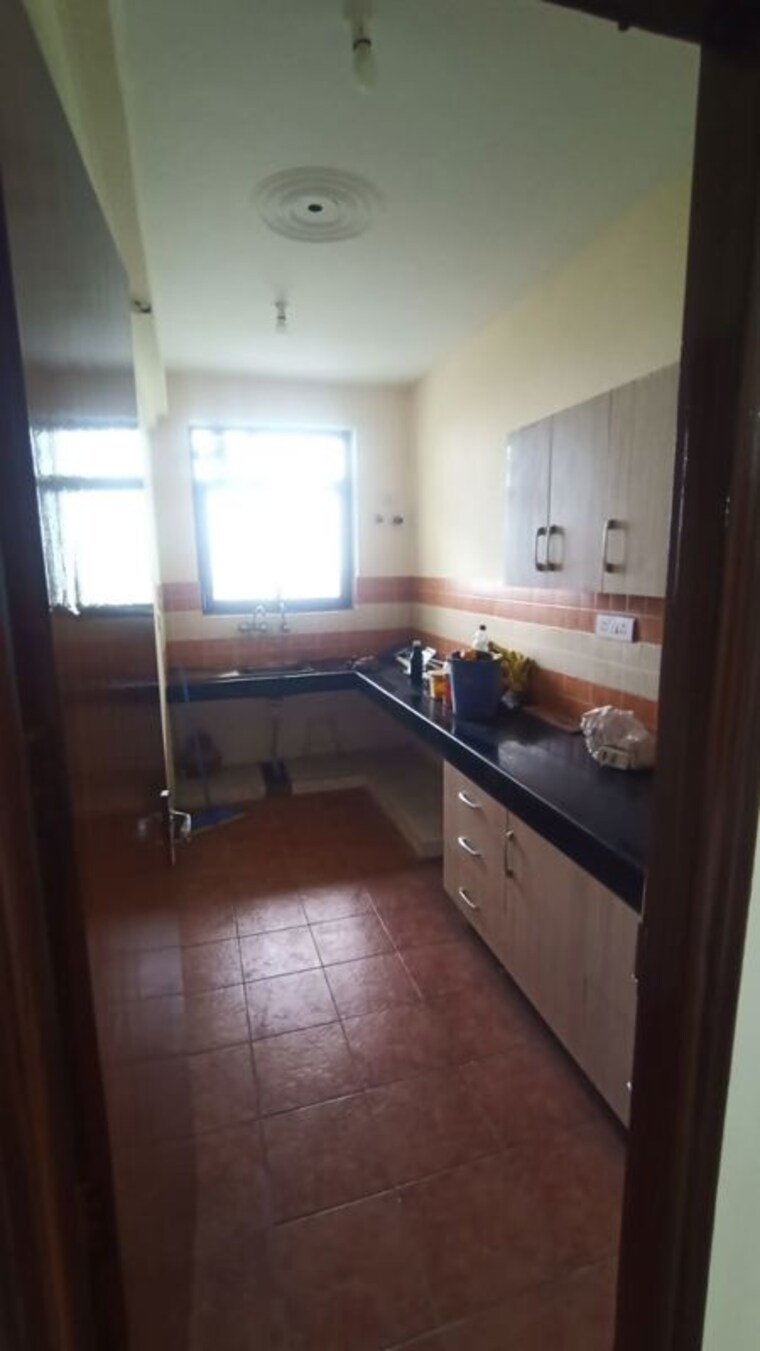 Kitchen, cosmos-executive 2 Bedroom 1100 Sq.Ft. Apartment In Sector 3 Gurgaon 10063462