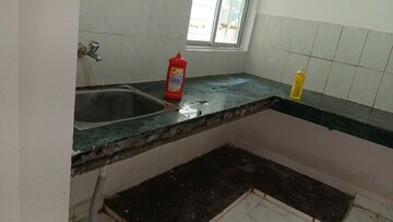 Kitchen in 2 BHK Apartment at Urban Axis Urban Woods, Sushant Golf City – for Rent