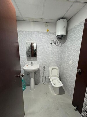 Bathroom in 2 BHK Apartment at Urban Axis Urban Woods, Sushant Golf City – for Rent