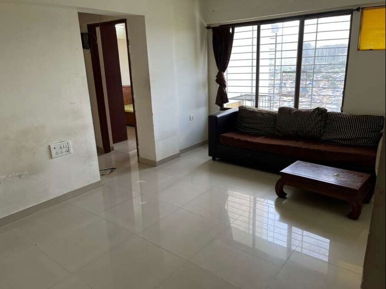Living Room, everest-world-aspen 2 Bedroom 550 Sq.Ft. Apartment In Dhokali Thane 10063825