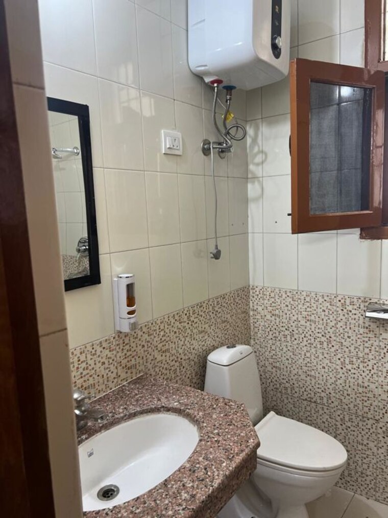 Bathroom, nk-sharma-savitry-greens 2 Bedroom 900 Sq.Ft. Apartment In Lohgarh Zirakpur 10063919