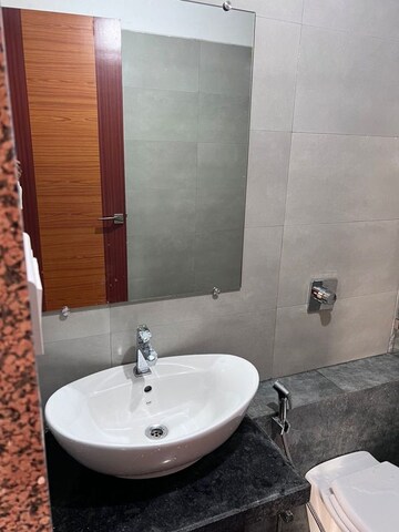 Bathroom in 4 BHK Apartment at Paradise Sai World City Phase 2, New Panvel – for Rent