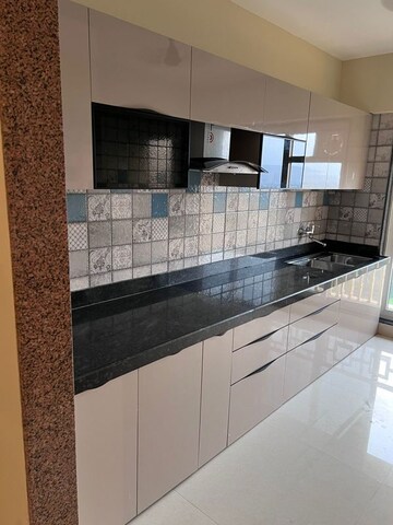 Kitchen in 4 BHK Apartment at Paradise Sai World City Phase 2, New Panvel – for Rent