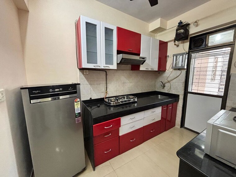 Kitchen, sun-city-mercury 2 Bedroom 680 Sq.Ft. Apartment In Powai Mumbai 10063984