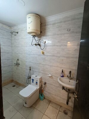 Bathroom in 2 BHK Builder Floor at Freedom Fighters Enclave – for Rent