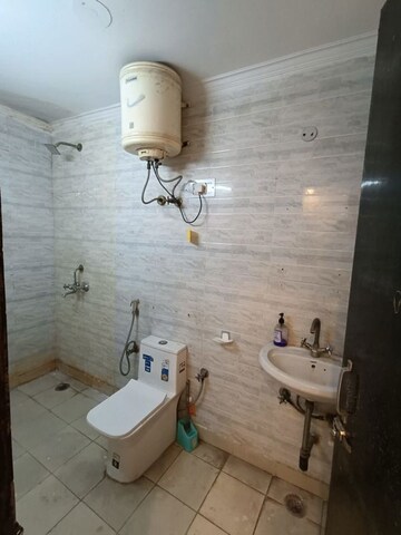 Bathroom in 2 BHK Builder Floor at Freedom Fighters Enclave – for Rent