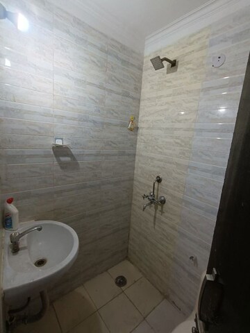Bathroom in 2 BHK Builder Floor at Freedom Fighters Enclave – for Rent