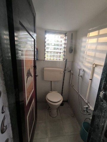 Bathroom in 2 BHK Apartment at Krishna Nisarga, Kalyan East – for Rent