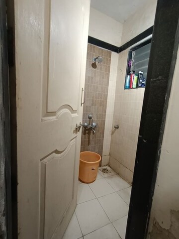 Bathroom in 2 BHK Apartment at Lake avenue CHS, Powai – for Rent