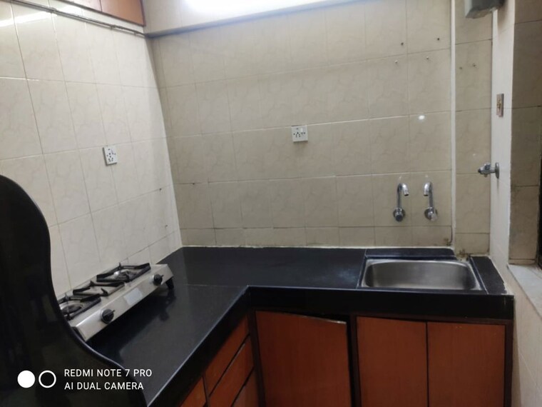 Kitchen, dosti-maitri-gardens 1 Bedroom 480 Sq.Ft. Apartment In Pokhran Road No Two Thane 10064031