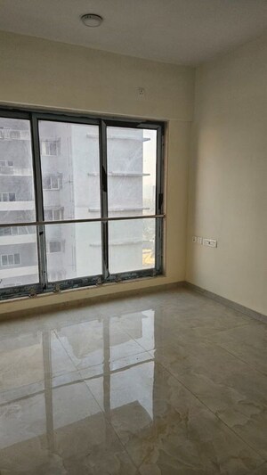 Room in 2 BHK Apartment at IM Applaud 38, Goregaon East – for Rent