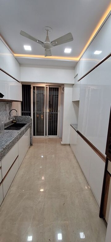 Kitchen in 2 BHK Apartment at Courtyard by Narang Realty and The Wadhwa Group, Pokhran Road No Two – for Rent