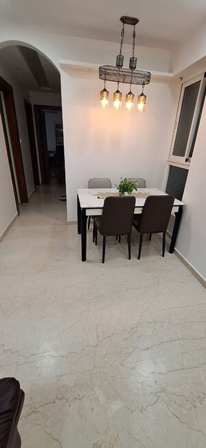 Living Room in 2 BHK Apartment at Courtyard by Narang Realty and The Wadhwa Group, Pokhran Road No Two – for Rent