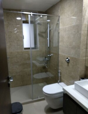 Bathroom in 4 BHK Apartment at Dynamix Woodlands Apartment, Malad East – for Rent
