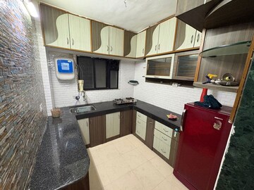 Kitchen in 2 BHK Apartment at Choice Goodwill Breeza, Dhanori – for Rent